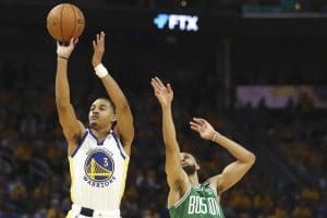 Media by Associated Press - CORRECTS TO GAME 2 INSTEAD OF GAME 1 - Golden State Warriors guard Jordan Poole (3) shoots against Boston Celtics guard Derrick White during the second half of Game 2 of basketball's NBA Finals in San Francisco, Sunday, June 5, 2022. (AP Photo/Jed Jacobsohn)