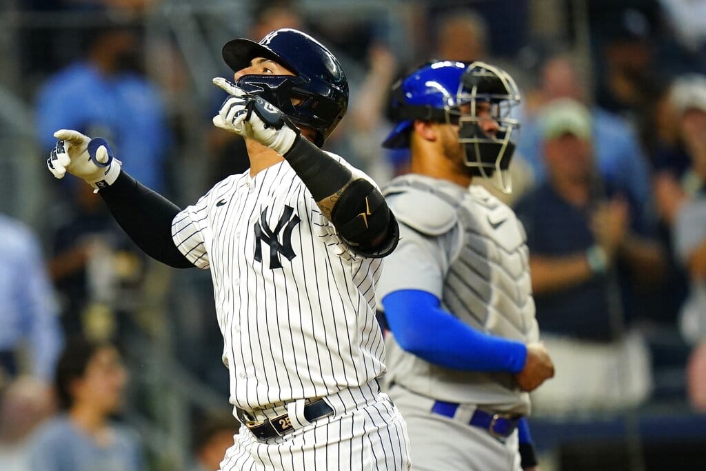 Media by Associated Press - New York Yankees' Gleyber Torres, left, gestures as he reaches home plate after hitting a home run during the fourth inning of a baseball game against the Chicago Cubs, Friday, June 10, 2022, in New York. (AP Photo/Frank Franklin II)