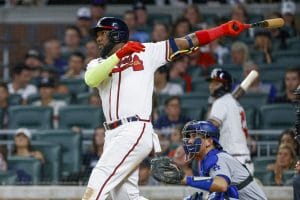 Media by Associated Press - Atlanta Braves' Marcell Ozuna through on a two-run home run against the Los Angeles Dodgers during the eighth inning of a baseball game Saturday, June 25, 2022, in Atlanta. (AP Photo/Bob Andres)