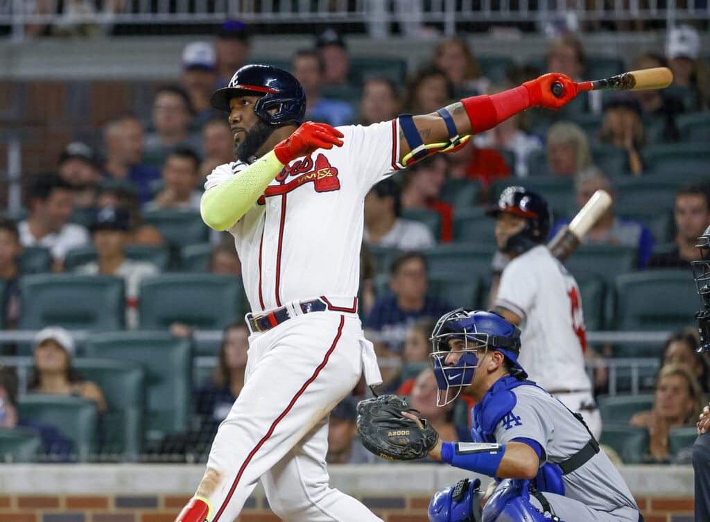 Media by Associated Press - Atlanta Braves' Marcell Ozuna through on a two-run home run against the Los Angeles Dodgers during the eighth inning of a baseball game Saturday, June 25, 2022, in Atlanta. (AP Photo/Bob Andres)