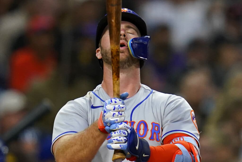 Media by Associated Press - New York Mets' Pete Alonso takes a breath as he bats during the third inning of a baseball game against the San Diego Padres, Monday, June 6, 2022, in San Diego. (AP Photo/Gregory Bull)