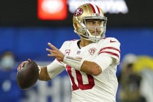 Media by Associated Press - FILE - San Francisco 49ers' Jimmy Garoppolo looks to throw during the second half of the NFC Championship NFL football game against the Los Angeles Rams, Jan. 30, 2022, in Inglewood, Calif. Garoppolo expects his shoulder to be ready for training camp — wherever that may be. He told the AP Pro Football Podcast on Thursday, April 21, 2022, that his rehab is going well and it is helping him deal with uncertainty surrounding his future with the 49ers. (AP Photo/Mark J. Terrill, File)