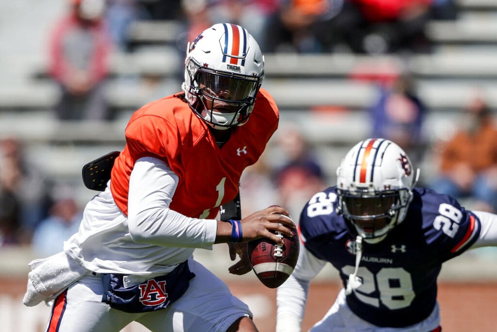 Media by Associated Press - Auburn quarterback T.J. Finley (1) scrambles for yardage during the A-Day NCAA college spring football game at Jordan-Hare Stadium, Saturday, April 9, 2022, in Auburn, Ala. (AP Photo/Butch Dill)