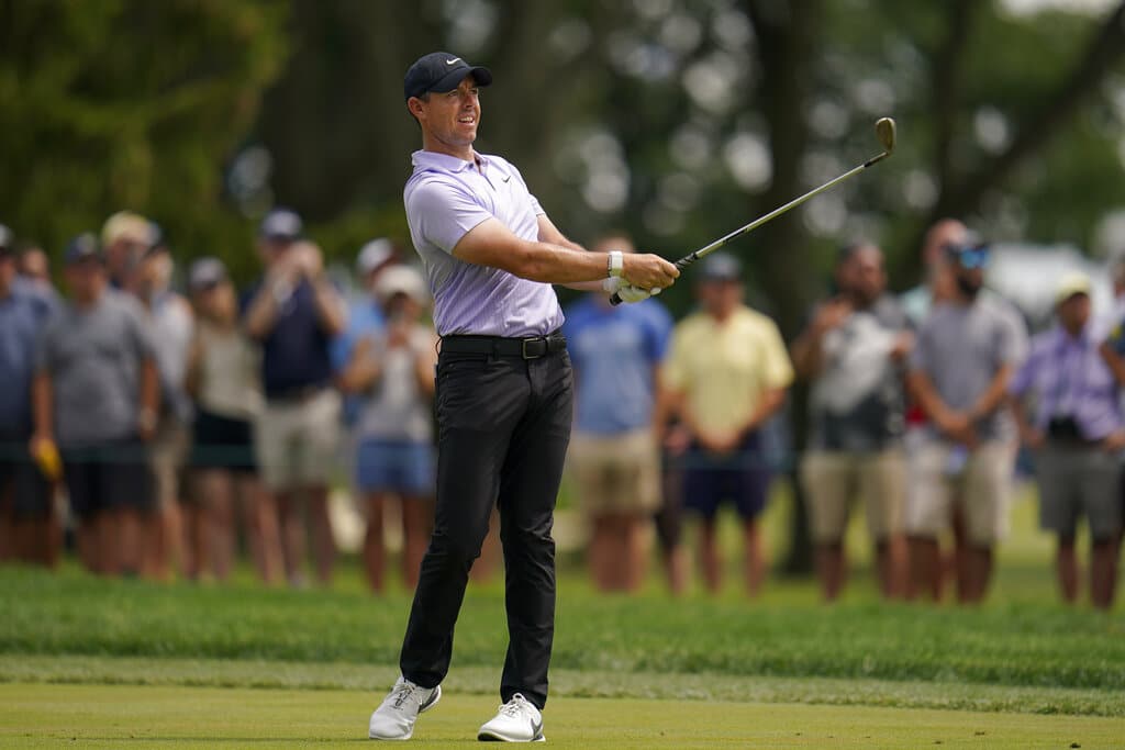 Media by Associated Press - Rory McIlroy, of Northern Ireland, hits toward the first green during the final round of the BMW Championship golf tournament at Wilmington Country Club, Sunday, Aug. 21, 2022, in Wilmington, Del. (AP Photo/Julio Cortez)