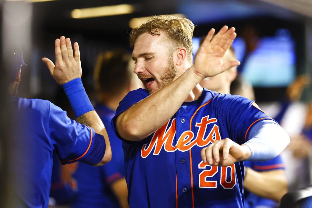 Media by Associated Press - New York Mets' Pete Alonso (20) celebrates in the dugout after Tyler Naquin scored off of a sacrifice bunt by Tomas Nido during the eighth inning of the second game of a baseball doubleheader against the Atlanta Braves, Saturday, Aug. 6, 2022, in New York. (AP Photo/Jessie Alcheh)