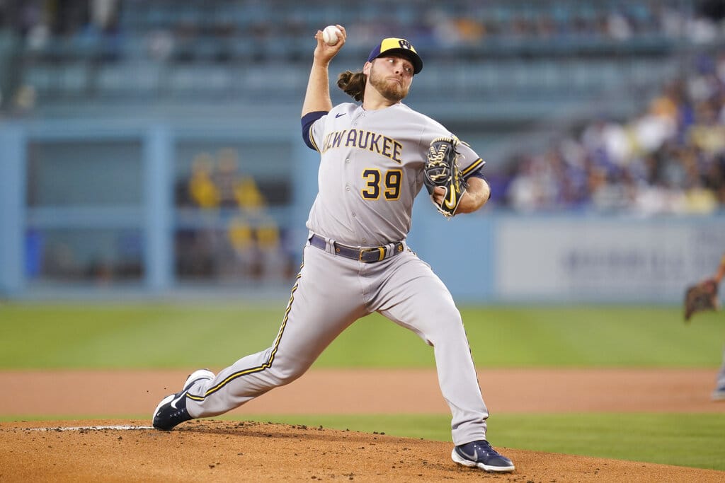 Media by Associated Press - Milwaukee Brewers starting pitcher Corbin Burnes (39) throws during the first inning of a baseball game against the Los Angeles Dodgers in Los Angeles, Tuesday, Aug. 23, 2022. (AP Photo/Ashley Landis)