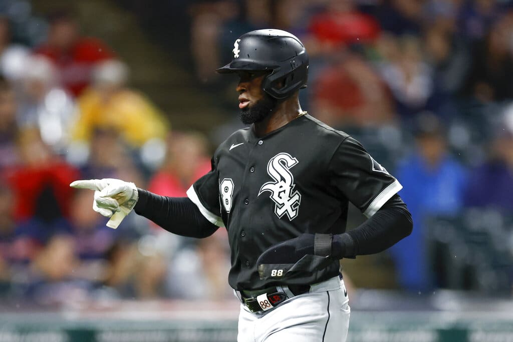 Media by Associated Press - Chicago White Sox's Luis Robert celebrates after scoring on a double by Jose Abreu during the sixth inning of a baseball game against the Cleveland Guardians, Saturday, Aug. 20, 2022, in Cleveland. (AP Photo/Ron Schwane)