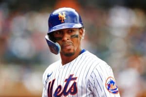 Media by Associated Press - New York Mets shortstop Francisco Lindor (12) goes to the dugout against the Washington Nationals during the seventh inning of a baseball game Sunday, Sept. 4, 2022, in New York. (AP Photo/Noah K. Murray)