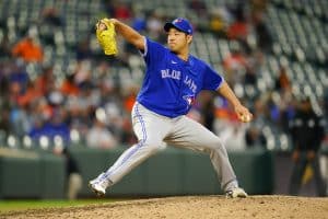 Media by Associated Press - Toronto Blue Jays starting pitcher Yusei Kikuchi throws a pitch to the Baltimore Orioles during the seventh inning of the second game of a baseball doubleheader, Wednesday, Oct. 5, 2022, in Baltimore. The Blue Jays won 5-1. (AP Photo/Julio Cortez)