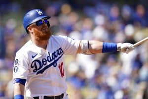 Media by Associated Press - Los Angeles Dodgers' Justin Turner hits during a baseball game against the Colorado Rockies Wednesday, Oct. 5, 2022, in Los Angeles. (AP Photo/Marcio Jose Sanchez)