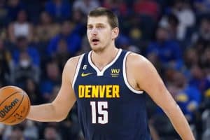 Media by Associated Press - Denver Nuggets center Nikola Jokic against the Golden State Warriors during an NBA preseason basketball game in San Francisco, Friday, Oct. 14, 2022. (AP Photo/Jeff Chiu)