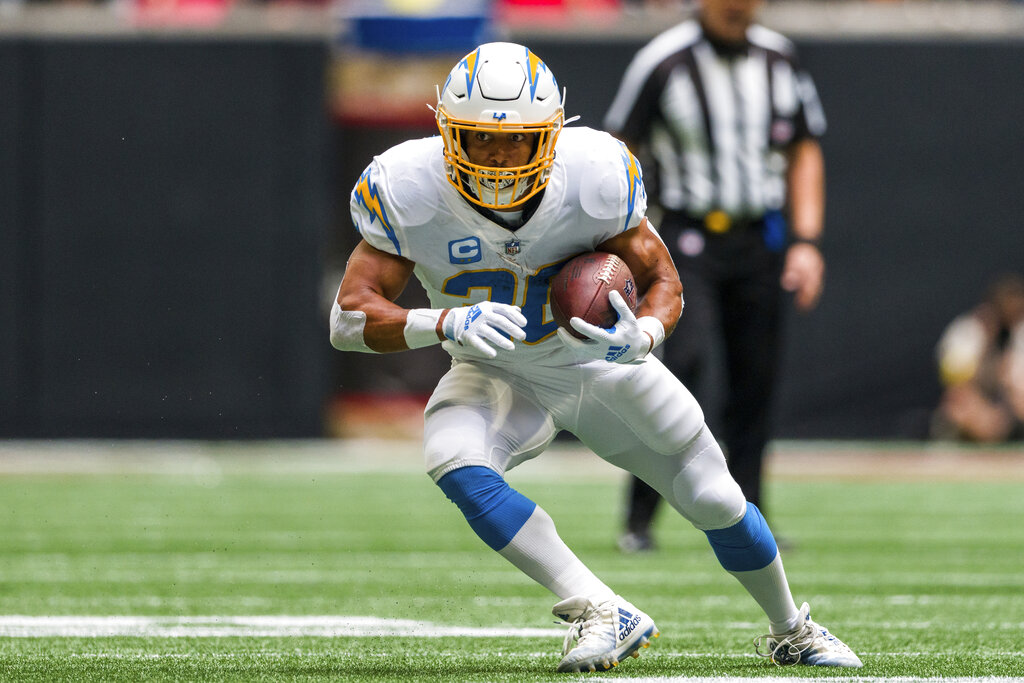 Media by Associated Press - Los Angeles Chargers running back Austin Ekeler (30) runs the ball during the first half of an NFL football game against the Atlanta Falcons, Sunday, Nov. 6, 2022, in Atlanta. The Los Angeles Chargers won 20-17. (AP Photo/Danny Karnik)