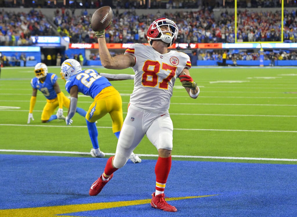 Media by Associated Press - Kansas City Chiefs tight end Travis Kelce (87) celebrates after scoring a touchdown during the fourth quarter of an NFL football game against the Los Angeles Chargers Sunday, Nov. 20, 2022, in Inglewood, Calif. (AP Photo/Jayne Kamin-Oncea)