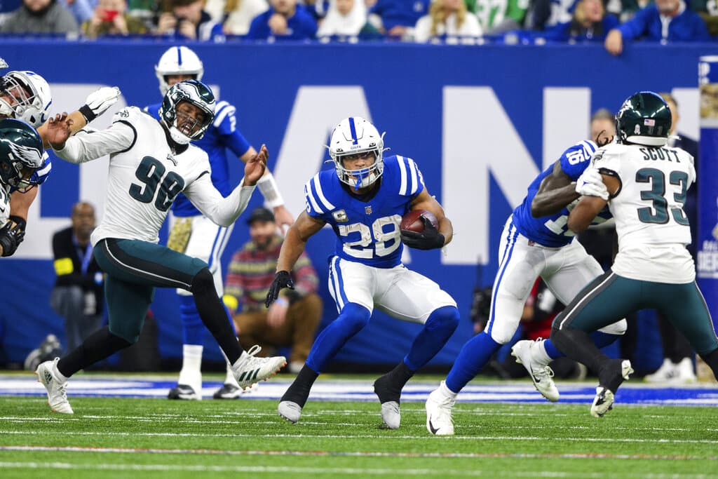 Media by Associated Press - Indianapolis Colts running back Jonathan Taylor (28) cuts to the outside during an NFL football game against the Philadelphia Eagles, Sunday, Nov. 20, 2022, in Indianapolis. (AP Photo/Zach Bolinger)