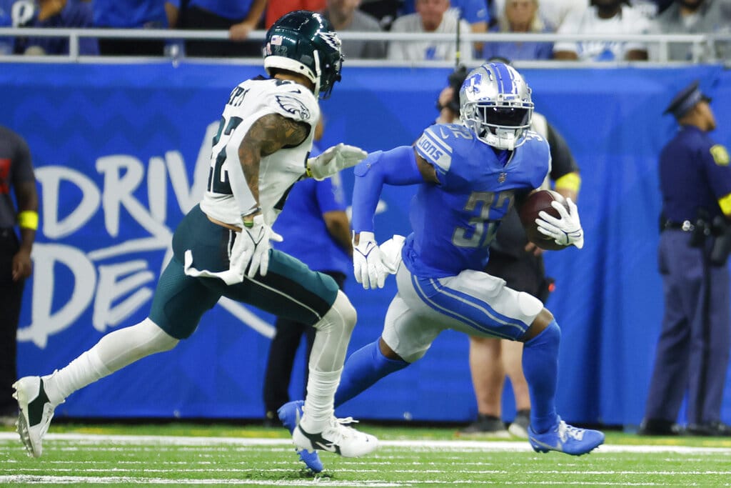 Media by Associated Press - Detroit Lions running back D'Andre Swift (32) rushes defended by Philadelphia Eagles safety Marcus Epps (22) in the second half during an NFL football game, Sunday, Sept. 11, 2022, in Detroit. (AP Photo/Rick Osentoski)