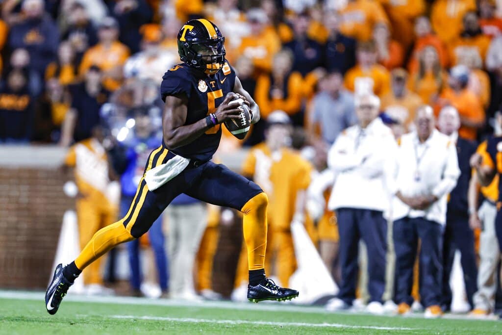 Media by Associated Press - Tennessee quarterback Hendon Hooker (5) runs for yardage during the first half of an NCAA college football game against Kentucky Saturday, Oct. 29, 2022, in Knoxville, Tenn. (AP Photo/Wade Payne)