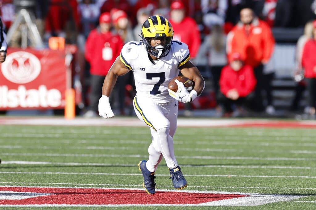 Media by Associated Press - Michigan running back Donovan Edwards plays against Ohio State during an NCAA college football game on Saturday, Nov. 26, 2022, in Columbus, Ohio. (AP Photo/Jay LaPrete)