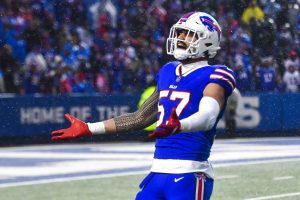 Buffalo Bills defensive end A.J. Epenesa (57) celebrates after a defensive stop against the New York Jets during the second half of an NFL football game in Orchard Park, N.Y., Sunday, Dec. 11, 2022. (AP Photo/Adrian Kraus) - Media by Associated Press