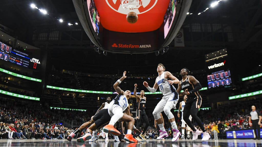 Media by Associated Press - Atlanta Hawks guard Dejounte Murray makes both free throws during the second half of an NBA basketball game against the Orlando Magic, Monday, Dec. 19, 2022, in Atlanta. (AP Photo/Hakim Wright Sr.)