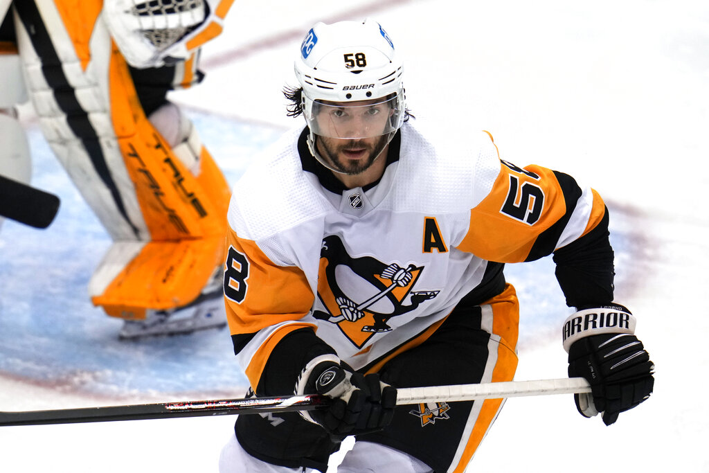 Media by Associated Press - Pittsburgh Penguins' Kris Letang skates during the third period of an NHL hockey game against the Buffalo Sabres in Pittsburgh, Saturday, Dec. 10, 2022. (AP Photo/Gene J. Puskar)