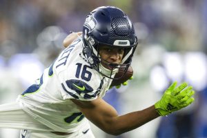 Media by Associated Press - Seattle Seahawks wide receiver Tyler Lockett (16) runs with the ball during an NFL football game against the Los Angeles Rams, Sunday, Dec. 4, 2022, in Inglewood, Calif. (AP Photo/Kyusung Gong)