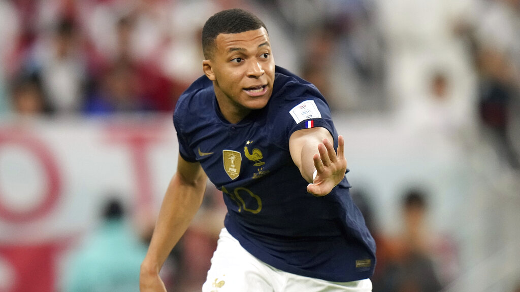 Media by Associated Press - France's Kylian Mbappe in action during the World Cup round of 16 soccer match between France and Poland, at the Al Thumama Stadium in Doha, Qatar, Sunday, Dec. 4, 2022. (AP Photo/Moises Castillo)