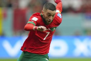 Media by Associated Press - Morocco's Hakim Ziyech in action during the World Cup semifinal soccer match between France and Morocco at the Al Bayt Stadium in Al Khor, Qatar, Wednesday, Dec. 14, 2022. (AP Photo/Francisco Seco)