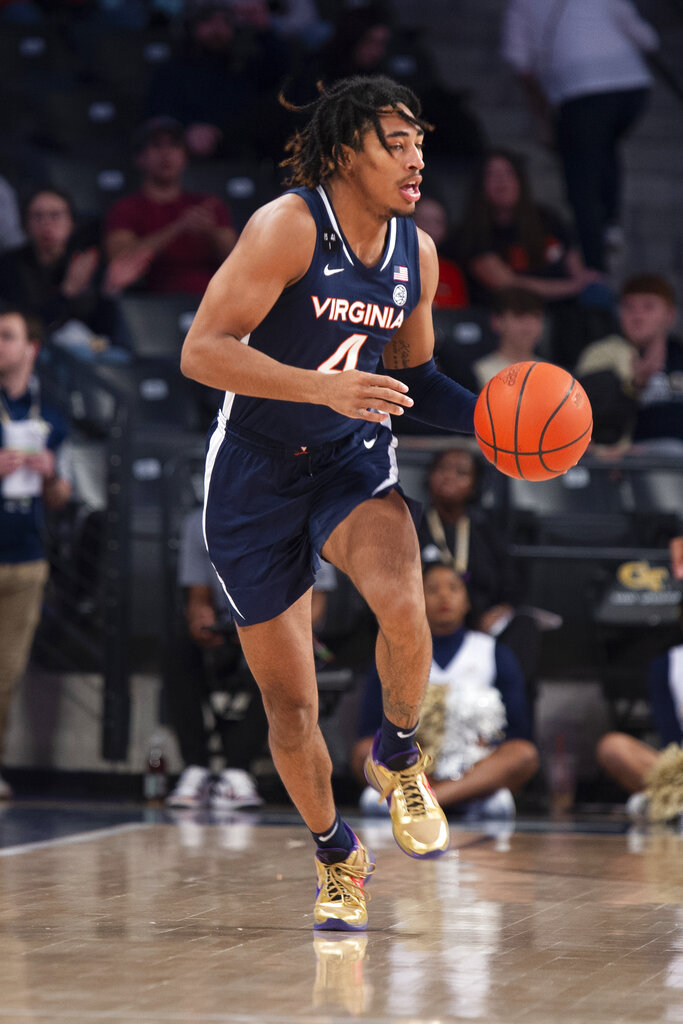 Virginia guard Armaan Franklin dribbles up court in the first half of an NCAA college basketball game against Georgia Tech, Saturday, Dec. 31, 2022, in Atlanta. (AP Photo/Hakim Wright Sr.) - Media by Associated Press