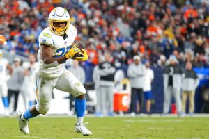 Media by Associated Press - Los Angeles Chargers running back Joshua Kelley (25) runs against the Denver Broncos during an NFL football game, Sunday, Jan. 8, 2023, in Denver. (AP Photo/Jack Dempsey)