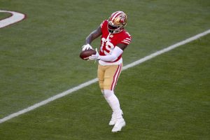 Media by Associated Press - San Francisco 49ers wide receiver Deebo Samuel (19) warms up before an NFL divisional round playoff football game against the Dallas Cowboys, Sunday, Jan. 22, 2023, in Santa Clara, Calif. (AP Photo/Scot Tucker)