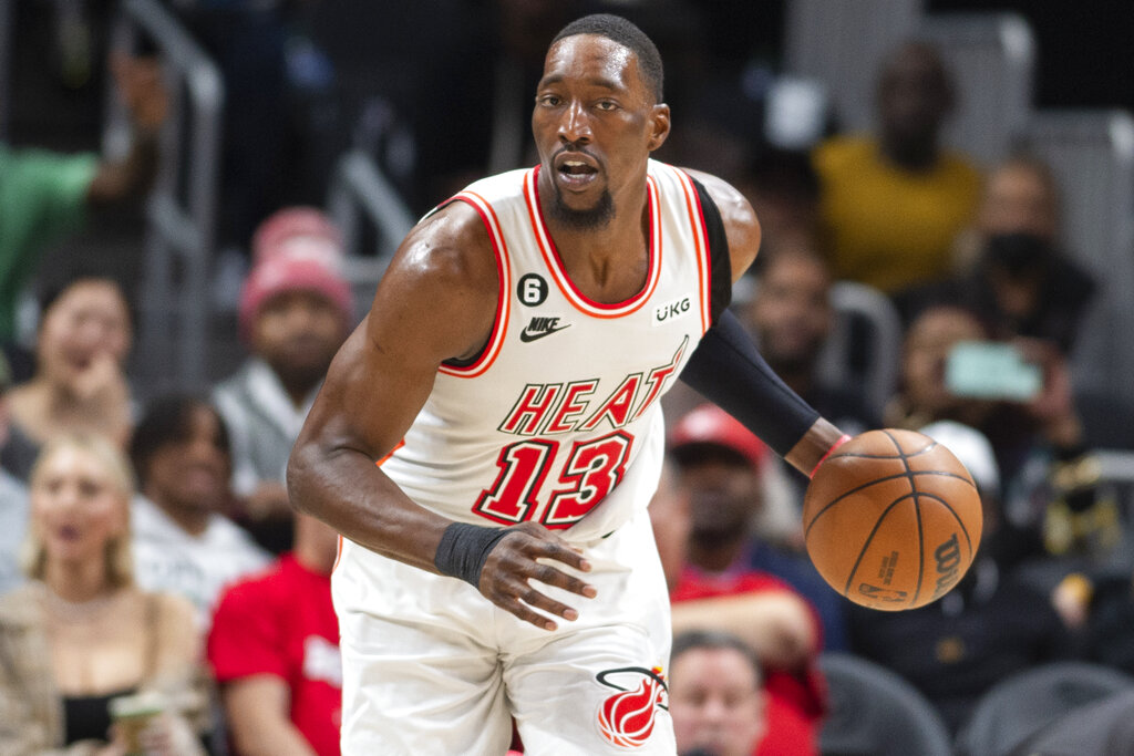 Media by Associated Press - Miami Heat center Bam Adebayo dribbles during the second half of an NBA basketball game against the Atlanta Hawks, Monday, Jan. 16, 2023, in Atlanta. (AP Photo/Hakim Wright Sr.)