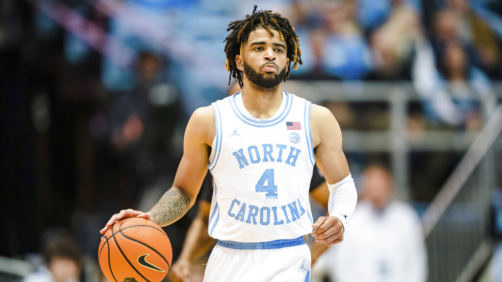 Media by Associated Press - North Carolina guard R.J. Davis (4) brings the ball up court against Notre Dame during an NCAA college basketball game on Saturday, Jan. 7, 2023, in Chapel Hill, N.C. (AP Photo/Jacob Kupferman)