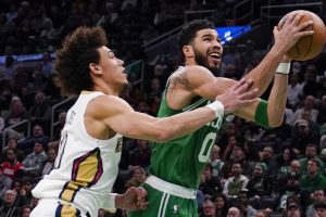 Media by Associated Press - Boston Celtics forward Jayson Tatum (0) during an NBA basketball game, Wednesday, Jan. 11, 2023, in Boston. (AP Photo/Charles Krupa)