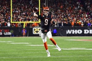 Media by Associated Press - Cincinnati Bengals quarterback Joe Burrow (9) throws a pass during an NFL wild-card football game against the Baltimore Ravens on Sunday, Jan. 15, 2023, in Cincinnati. (AP Photo/Emilee Chinn)