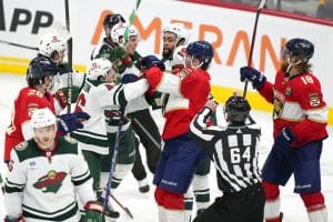 Media by Associated Press - Players scuffle during the third period of an NHL hockey game between the Florida Panthers and the Minnesota Wild, Saturday, Jan. 21, 2023, in Sunrise, Fla. (AP Photo/Wilfredo Lee)