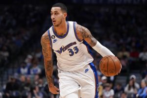 Media by Associated Press - Washington Wizards forward Kyle Kuzma (33) dribbles during the second half of an NBA basketball game against the Dallas Mavericks in Dallas, Tuesday, Jan. 24, 2023. (AP Photo/LM Otero)