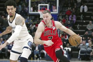 Media by Associated Press - Chicago Bulls Goran Dragic (7) drives to the basket as Memphis Grizzlies Danny Green (14) in the second half of an NBA basketball game Tuesday, Feb. 7, 2023, in Memphis, Tenn. (AP Photo/Karen Pulfer Focht)