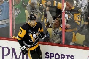 Media by Associated Press - Pittsburgh Penguins center Evgeni Malkin celebrates a goal against the New Jersey Devils during the third period of an NHL hockey game in Pittsburgh, Saturday, Feb. 18, 2023. (AP Photo/Matt Freed)