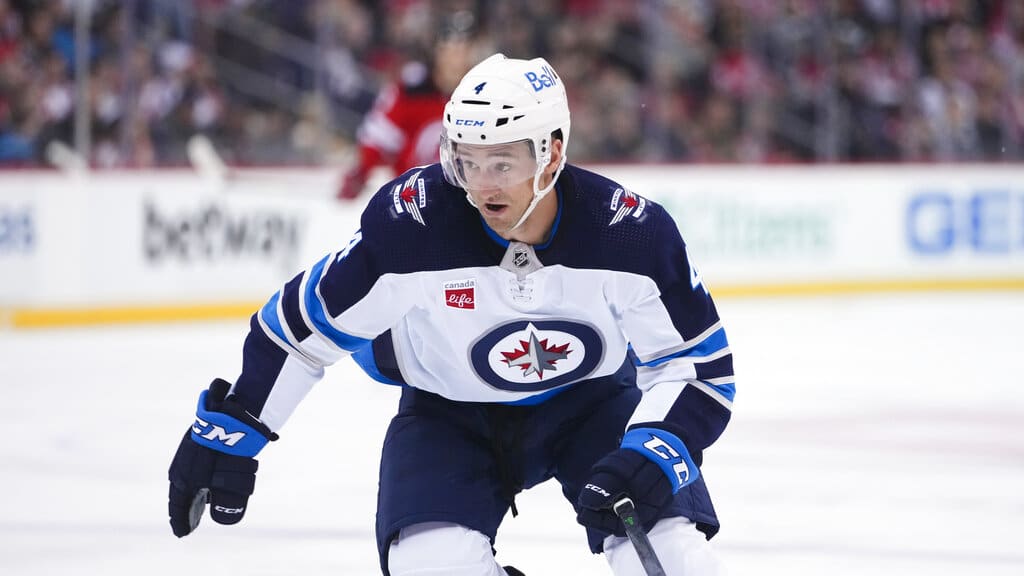 Media by Associated Press - Winnipeg Jets' Neal Pionk (4) during the second period of an NHL hockey game against the New Jersey Devils Sunday, Feb. 19, 2023, in Newark, N.J. (AP Photo/Frank Franklin II)