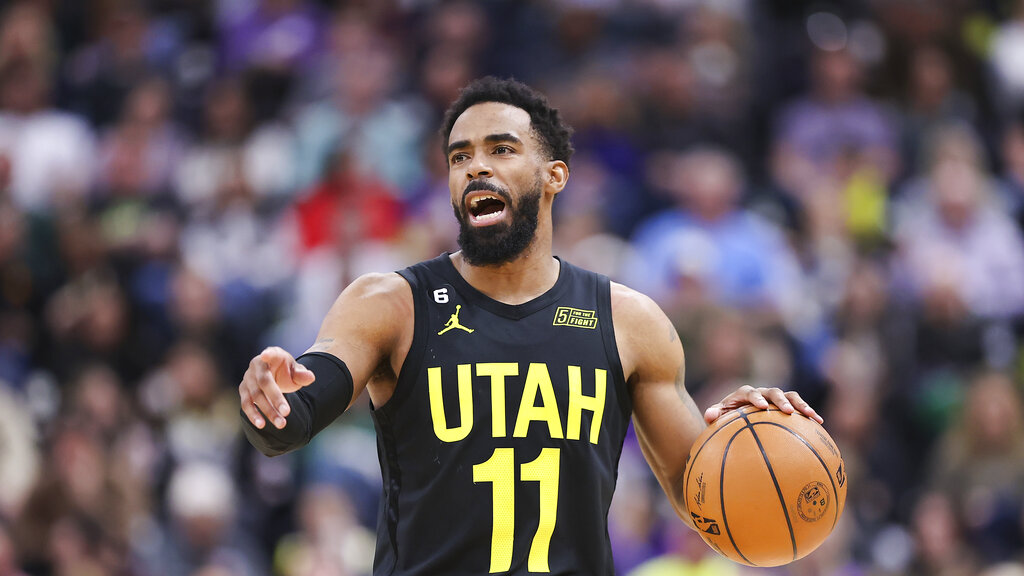 Media by Associated Press - Utah Jazz guard Mike Conley (11) dribbles the ball against the Dallas Mavericks in the first half of an NBA basketball game Saturday, Jan. 28, 2023, in Salt Lake City. (AP Photo/Rob Gray)