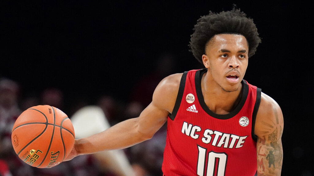 Media by Associated Press - North Carolina State Wolfpack guard Breon Pass (10), during NCAA men's basketball ACC tournament game against North Carolina State Wolfpack Clemson Tigers, Tuesday March 8, 2022, in New York. (AP Photo/John Minchillo)