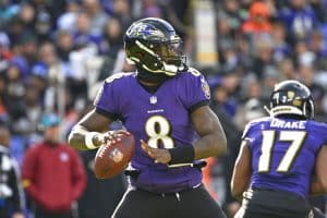 Media by Associated Press - FILE - Baltimore Ravens quarterback Lamar Jackson (8) looks to pass the ball during the first half of an NFL football game against the Denver Broncos, Sunday, Dec. 4, 2022, in Baltimore. Lamar Jackson was again absent from practice during the portion open to reporters Wednesday, Jan. 11, 2023. The Baltimore star hasn't practiced since injuring his knee in a Dec. 4 win over Denver, and there was no sign of him Wednesday as the Ravens prepared for Sunday night's playoff opener at Cincinnati. Jackson missed the final five games of the regular season.(AP Photo/Terrance Williams, File)