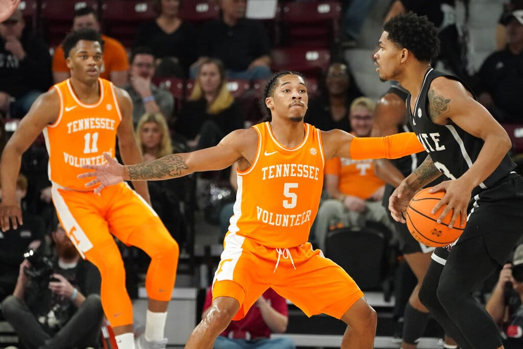 Media by Associated Press - Tennessee guard Zakai Zeigler (5) and forward Tobe Awaka (11) guard Mississippi State guard Shakeel Moore (3) during the first half of an NCAA college basketball game in Starkville, Miss., Tuesday, Jan. 17, 2023. Tennessee won 70-59. (AP Photo/Rogelio V. Solis)