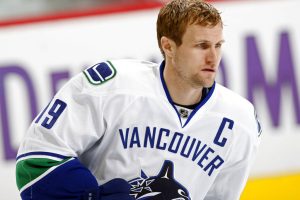 Media by Associated Press - Vancouver Canucks left winger Markus Naslund, of Sweden, warms up to face the Colorado Avalanche as the teams skate before playing in an NHL hockey game in Denver on Sunday, Dec. 23, 2007. (AP Photo/David Zalubowski)